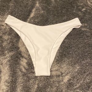 White and black bathing suit bottoms